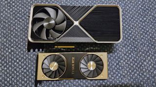 Nvidia quad slot unreleased graphics card next to a Titan card for size reference