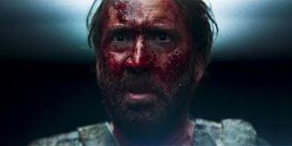 Nicolas Cage, with a face covered in blood in Mandy