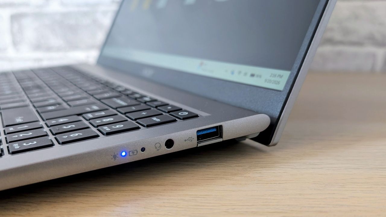 The Acer Aspire Go on the ITPro background