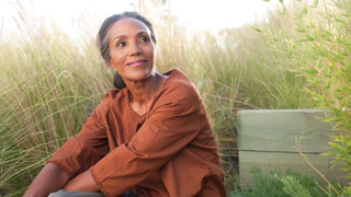 Woman sitting on grass