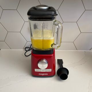 Magmix Power Blender jug containing warm water and washing liquid for cleaning