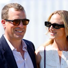 Peter Phillips and Harriet Sperling wearing sunglasses and smiling