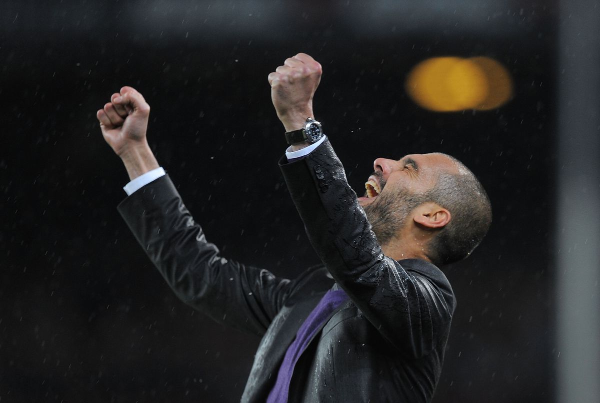 Barcelona coach Pep Guardiola celebrates a goal against Tenerife at Camp Nou in May 2010.