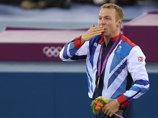 Chris Hoy at the London Olympics blowing a kiss and wearing a gold medal