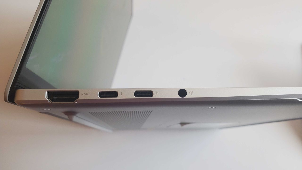light silver laptop on table