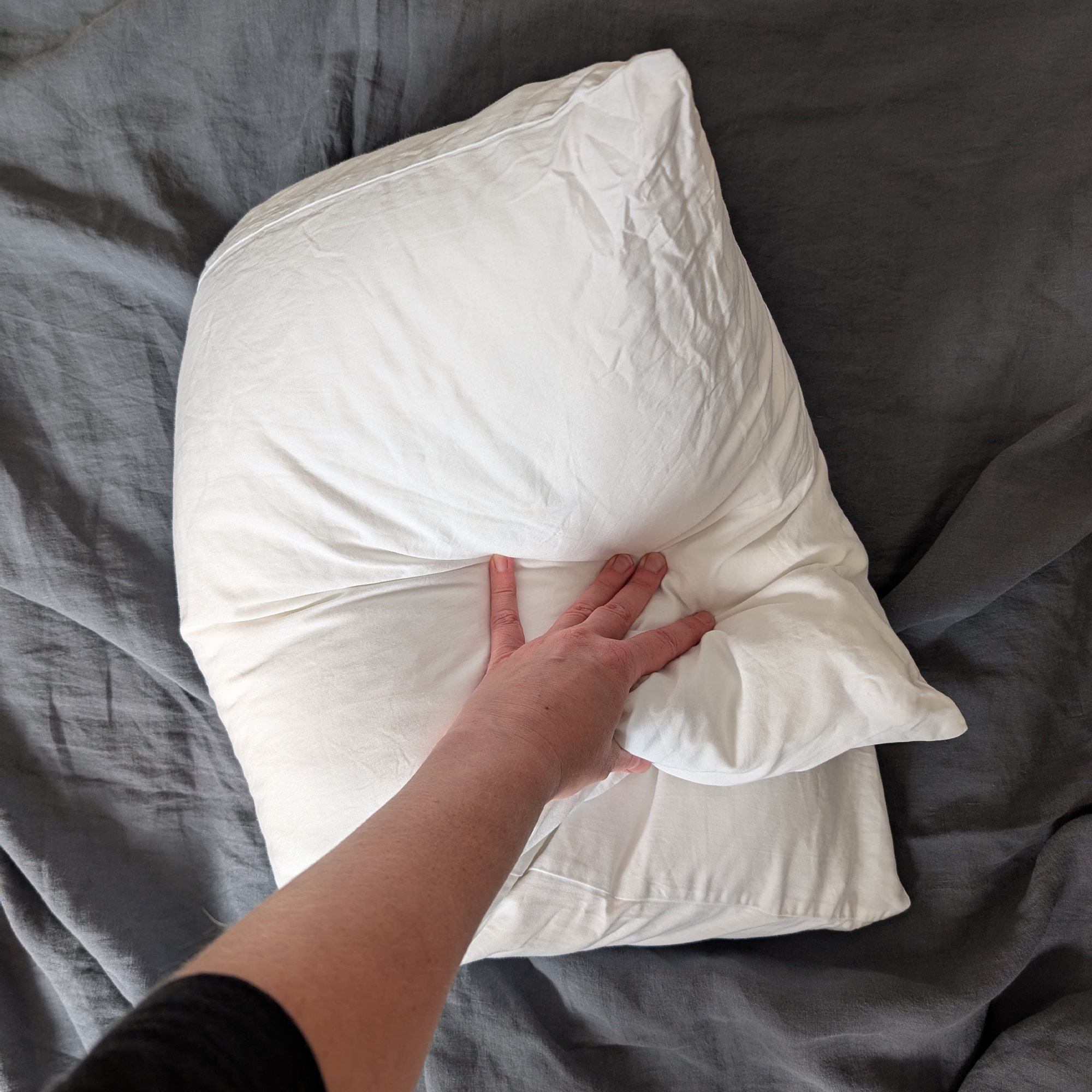 Person testing bedding