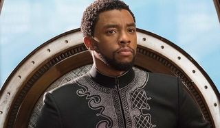 Black Panther T'Challa sits stoic on his throne