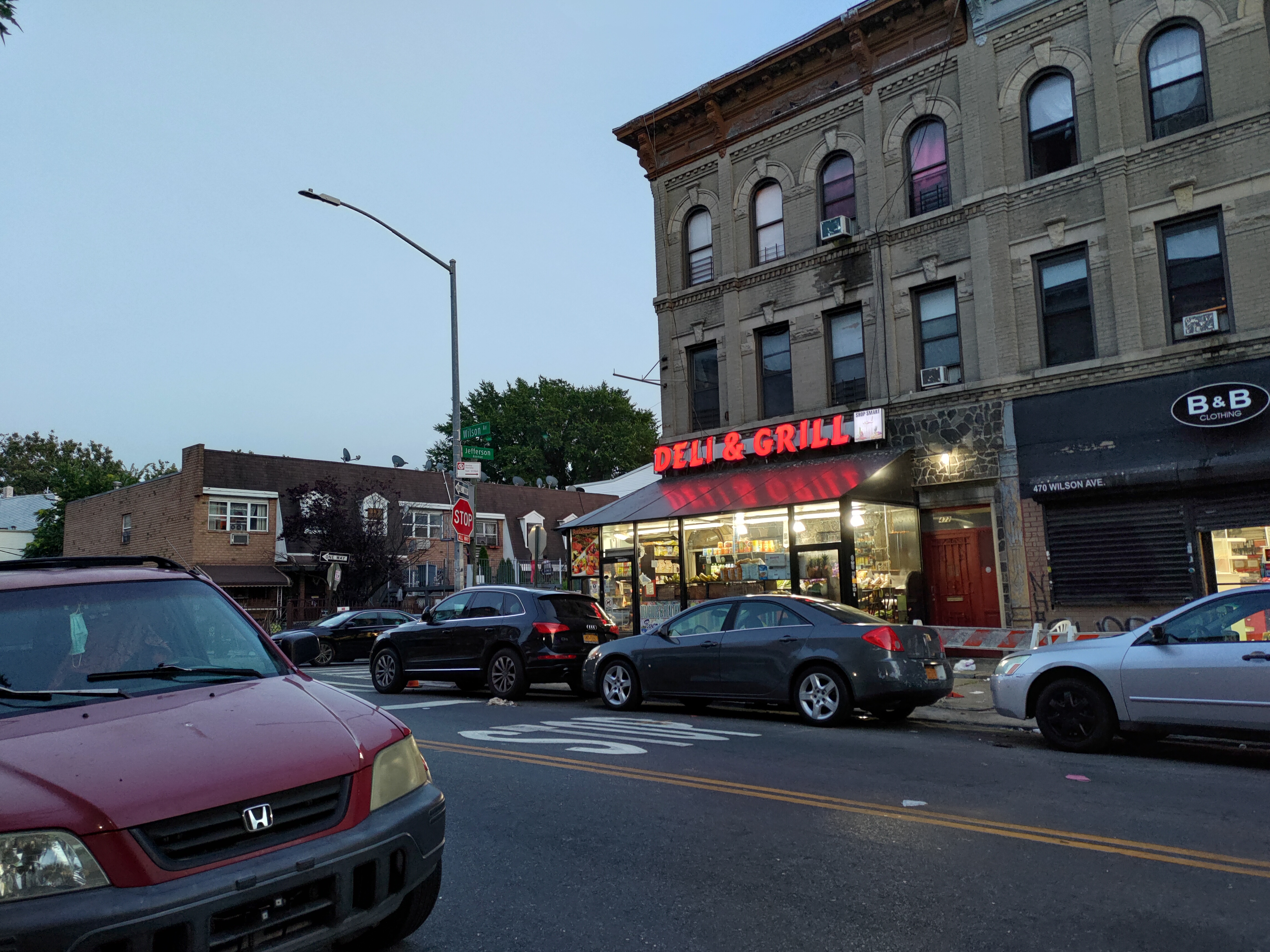 Street view at dusk; note the lights washed out inside