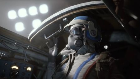 Arc Raiders player sits in launch tube with a helmet