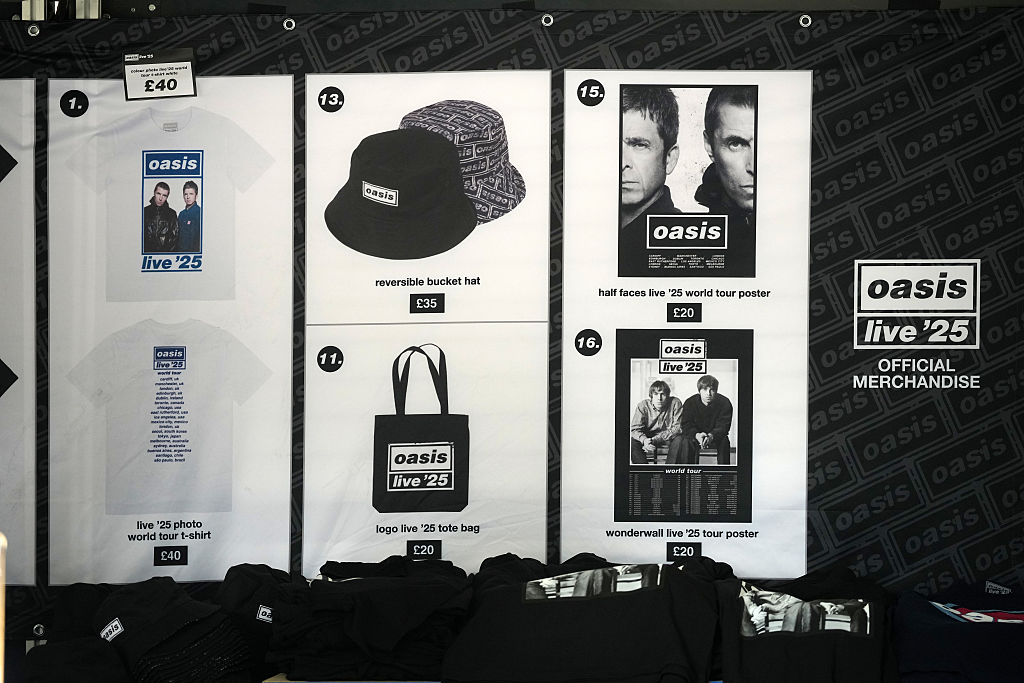 Oasis merchandise is displayed for sale at the fans shop outside Manchester Library