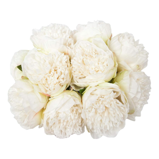 A bunch of white artificial silk peonies