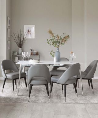 White Ceramic Marble Dining Table and Clover Faux Leather Dining Chairs