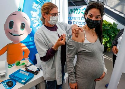 Pregnant woman gets vaccinated in Israel