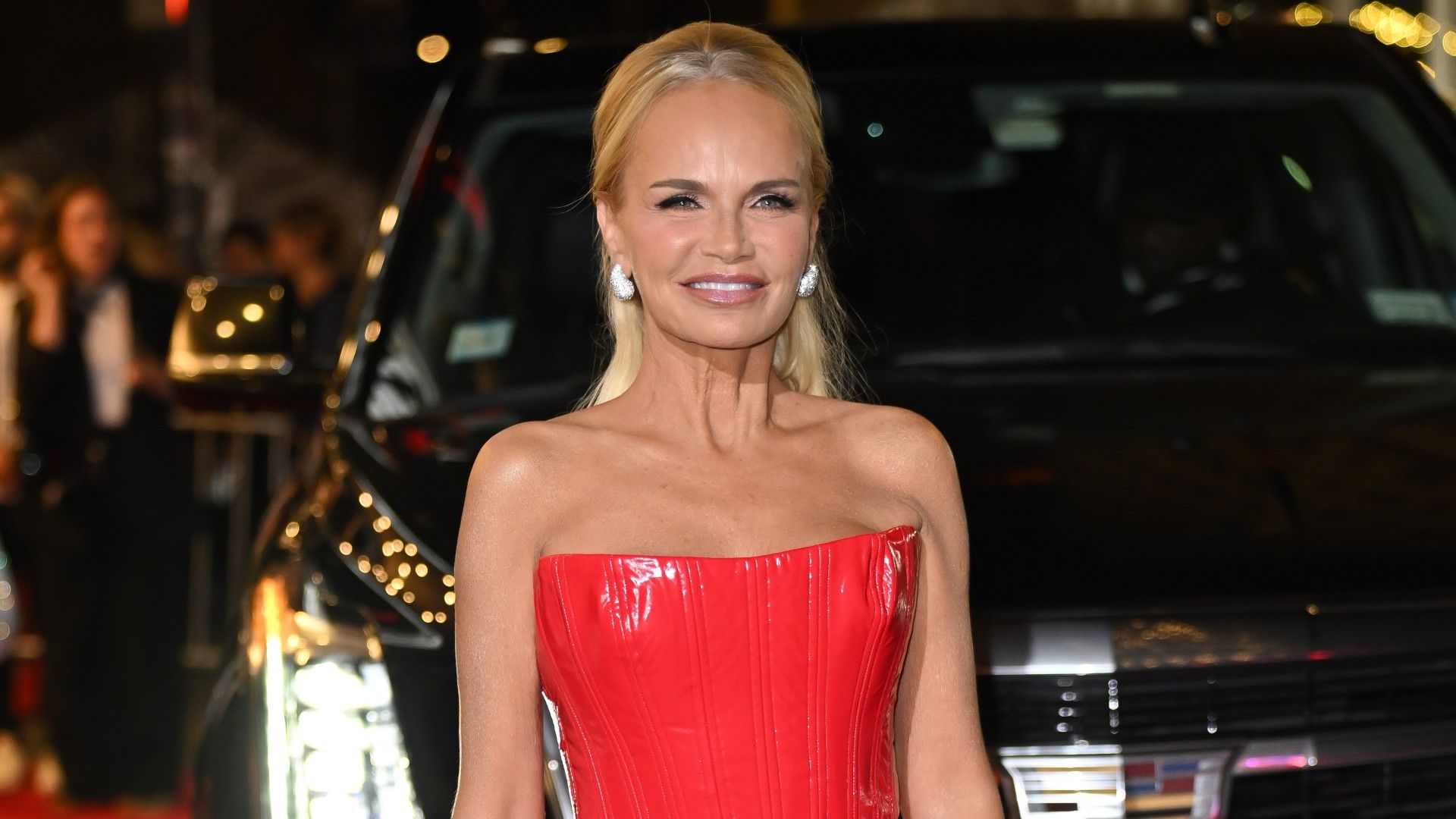 Kristin Chenoweth with blunt bangs and a lob haircut