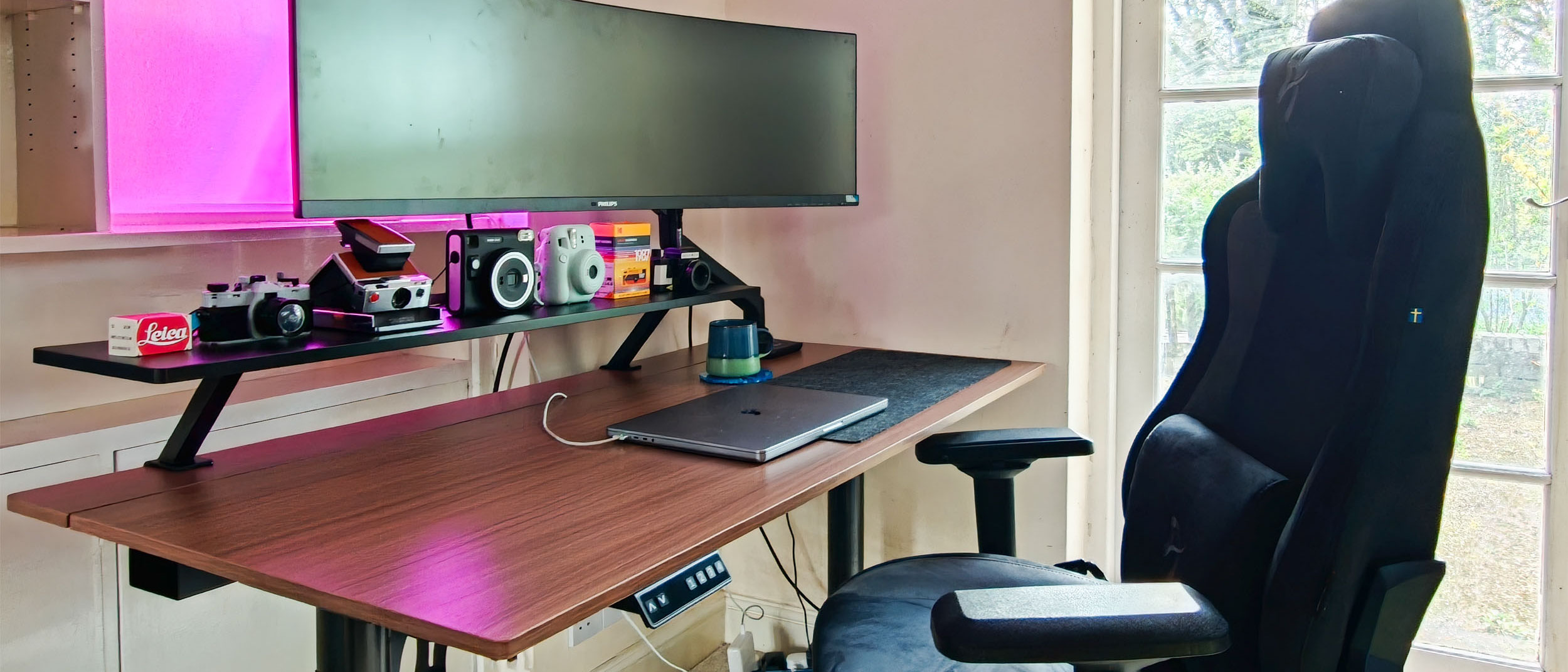 The Arozzi Arena Nordico Electric Standing Desk, freshly assembled, in home office room