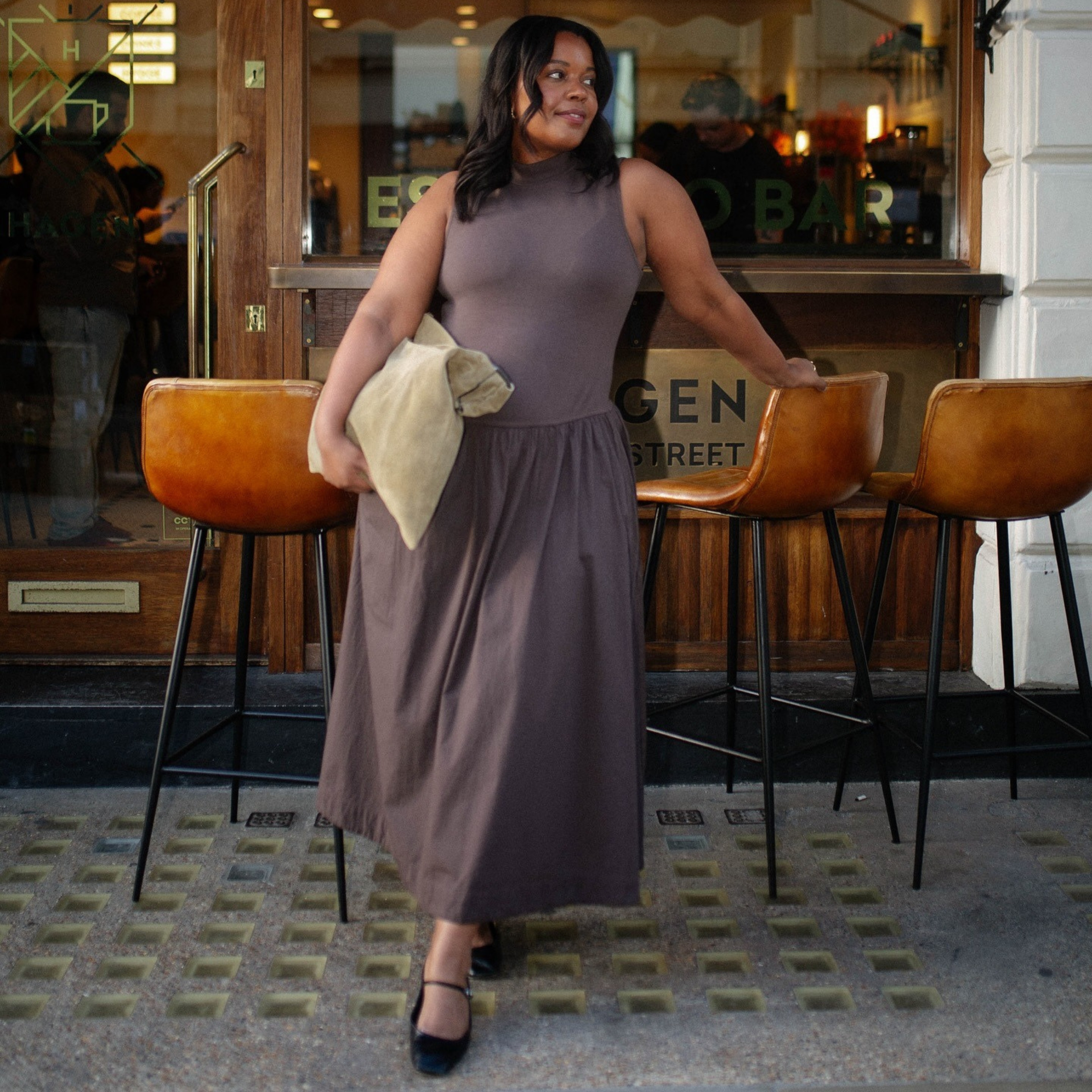 woman wears brown summer dress