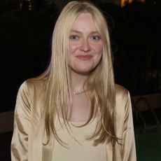 Dakota Fanning styled a slip dress and a matching silky robe with the heeled flip-flops trend 