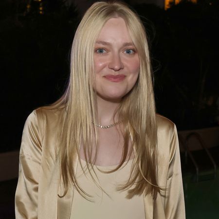Dakota Fanning styled a slip dress and a matching silky robe with the heeled flip-flops trend 