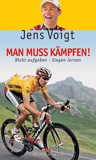 Jens Voigt on his book cover that is aptly titled Man muss kämpfen (One has to fight).