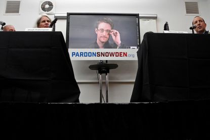 Edward Snowden speaks via video during a press conference in New York City on Sept. 14.