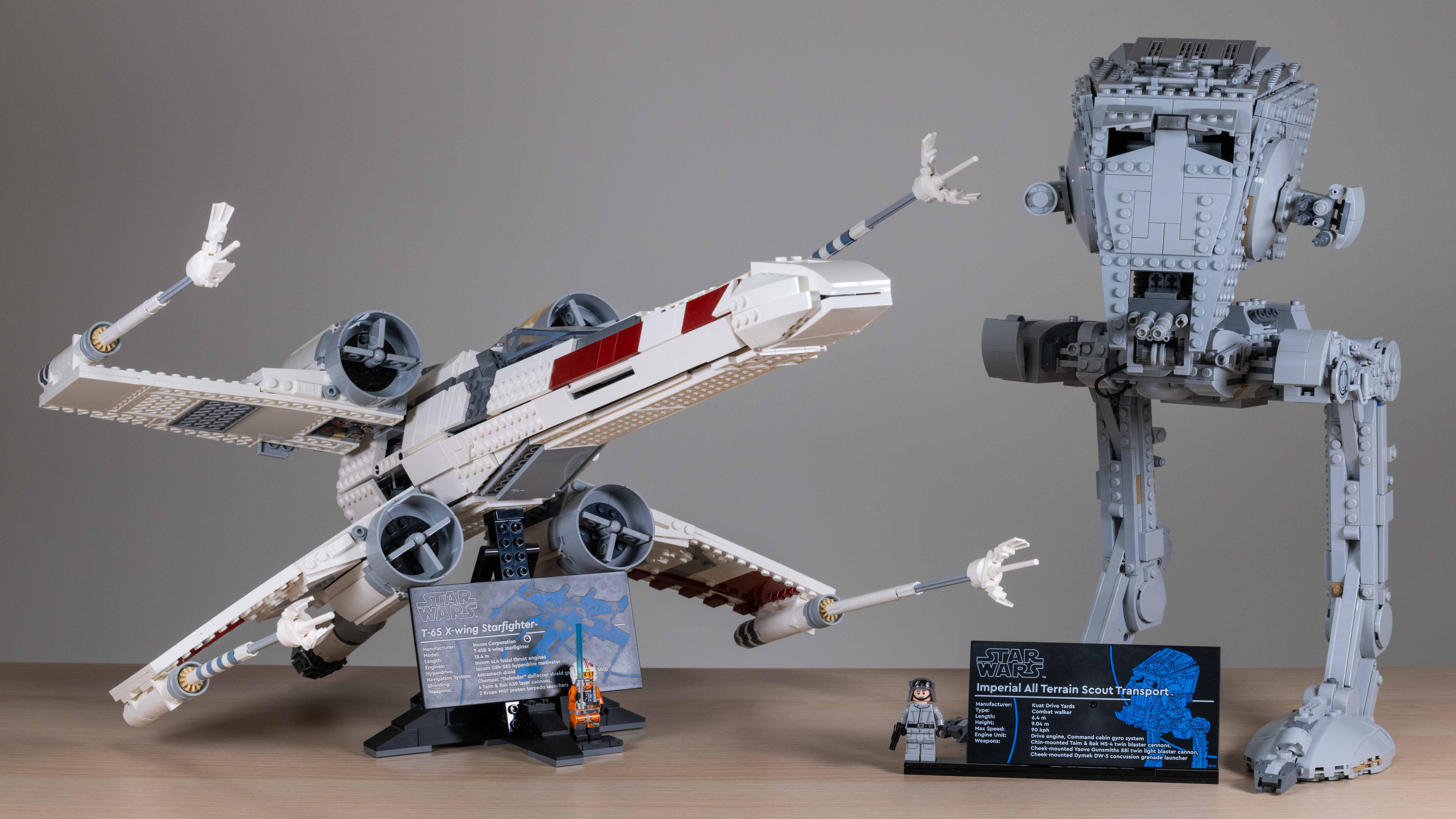Lego Star Wars AT-ST Walker (75417) on a neutral background next to UCS X-wing