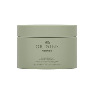 Origins Ginger Souffle Whipped Body Cream in green packaging is one of the best smelling body lotions.