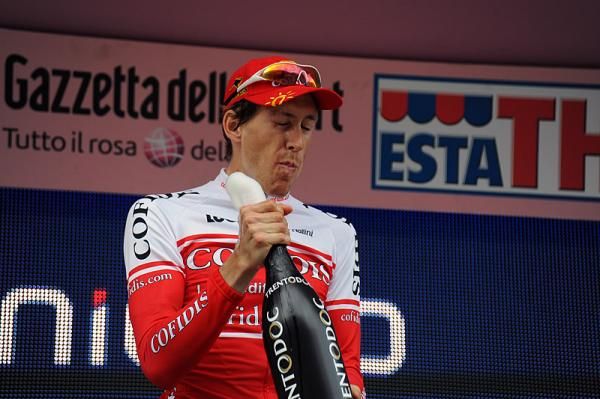 Stage winner Damien Monier (Cofidis, le Credit en Ligne) takes a swig of champagne.