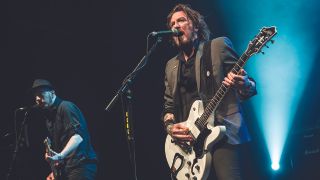 Ginger Wildheart performing onstage with The Wildhearts