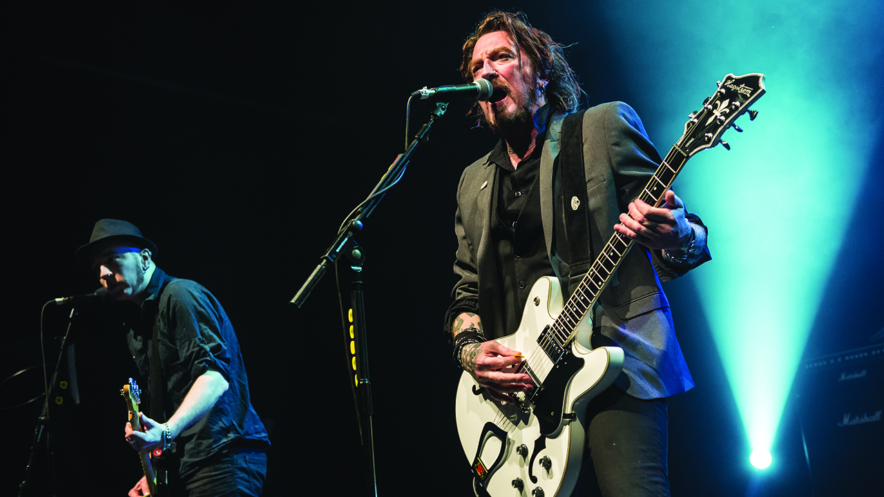 Ginger Wildheart performing onstage with The Wildhearts