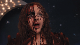 Chloe Grace Moretz covered in blood as Carrie