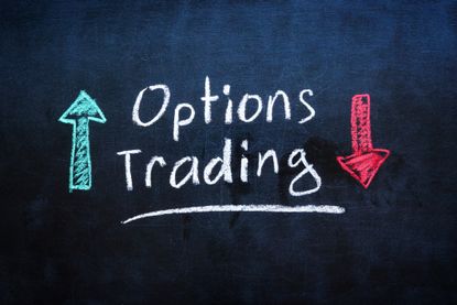 Chalkboard with options trading written in white chalk