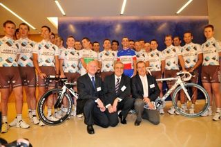 Riders and staff pose at Ag2R La Mondiale headquarters.