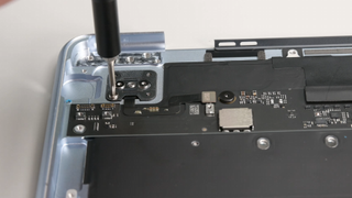 Shots from iFixIt's MacBook Air M4 teardown video.