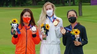 Nelly Korda, Mone Inami and Lydia Ko with their Olympic medals after finishing first, second and third at the 2021 Tokyo Games