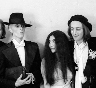 (from left) David Bowie, Yoko Ono, and John Lennon, photographed at the 17th Annual Grammy Awards on March 1, 1975