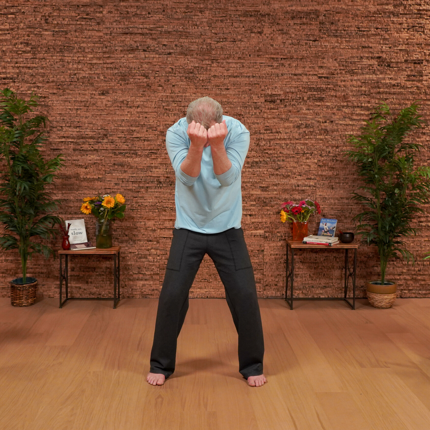 Man demonstrating Qigong movements