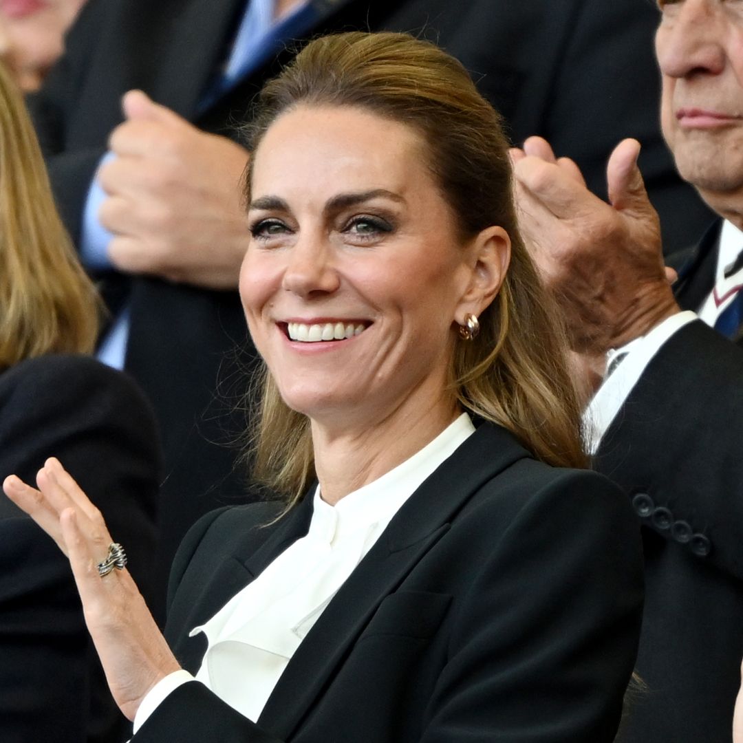 Kate Middleton attends the women&#039;s rugby wearing a black suit and ruffled white shirt