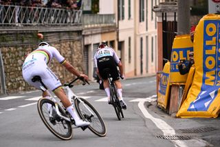 SANREMO ITALY MARCH 16 LR Mathieu van der Poel of The Netherlands and Team Alpecin Deceuninck and Tadej Pogacar of Slovenia and UAE Team Emirates compete in the breakaway during the 115th MilanoSanremo 2024 a 288km one day race from Pavia to Sanremo UCIWT on March 16 2024 in Sanremo Italy Photo by Fabio Ferrari PoolGetty Images