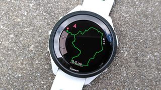Garmin Forerunner 265 watch showing course for running