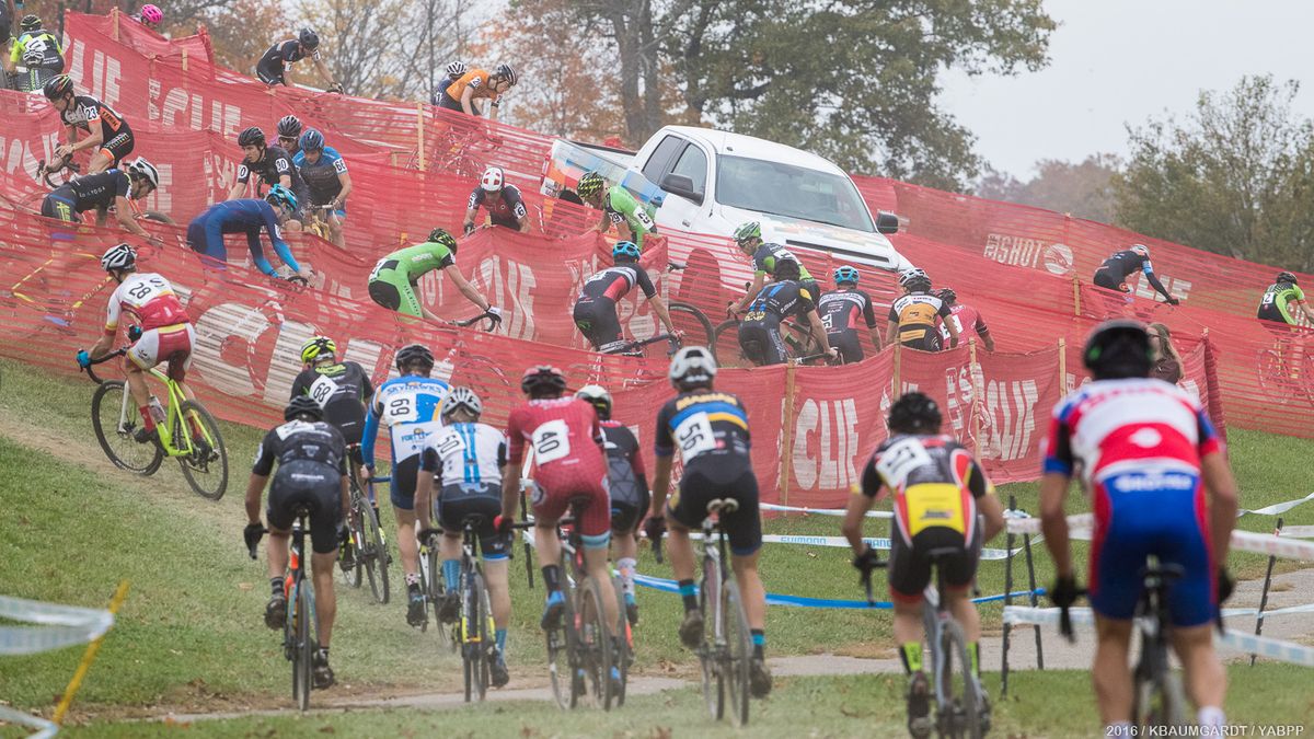 The famous "camel hump" at Kings CX turned treacherous after the first lap from repeated rain showers.