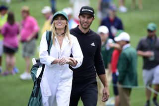 Paulina Gretzky caddying for her husband Dustin Johnson at The Masters, Augusta
