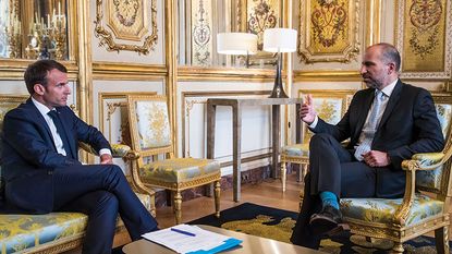 Emmanuel Macron and Uber CEO Dara Khosrowshahi