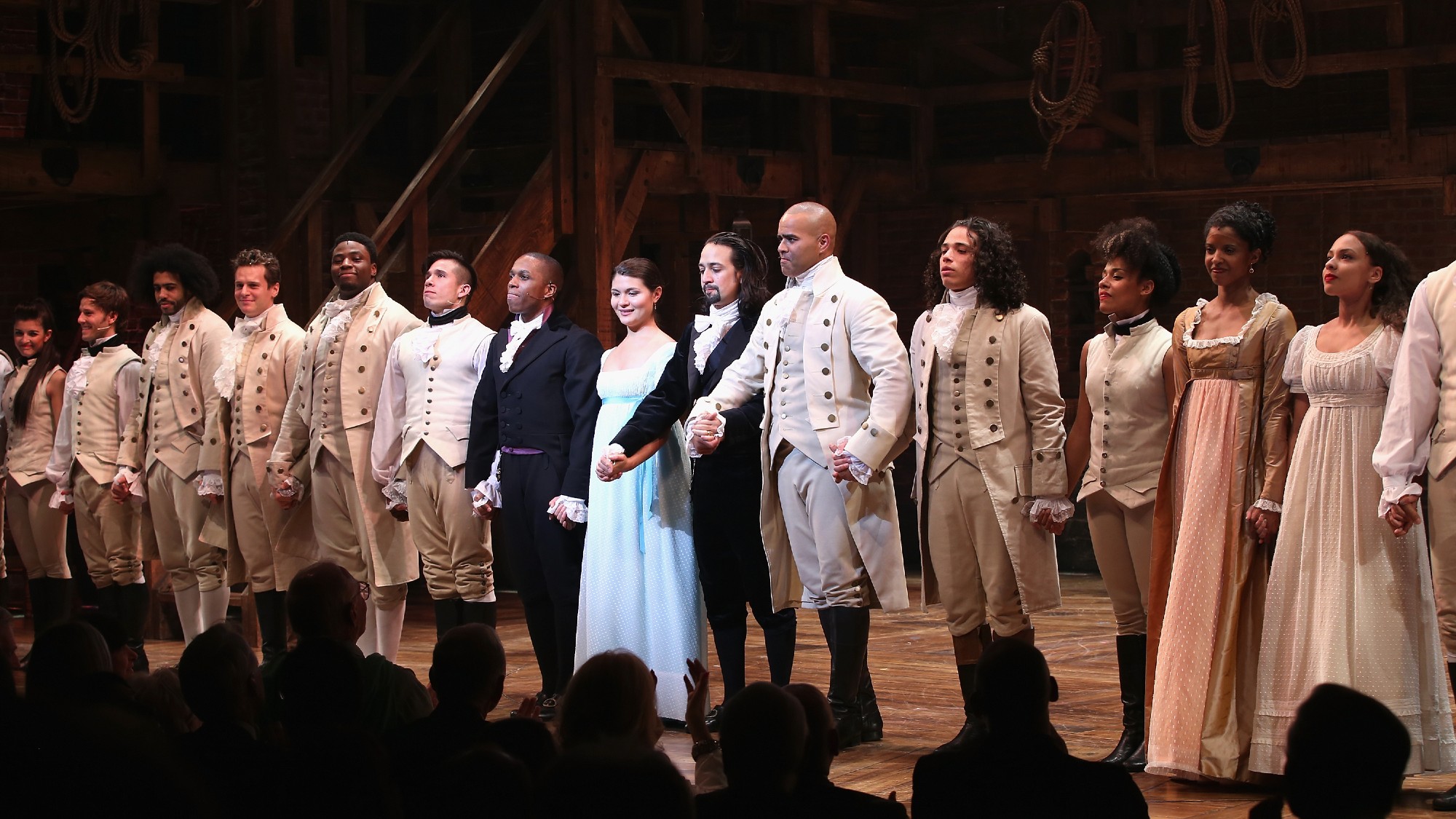 the original Broadway cast of "Hamilton," in a line and taking bows on opening night