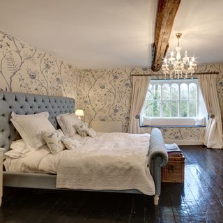 bedroom with white windows