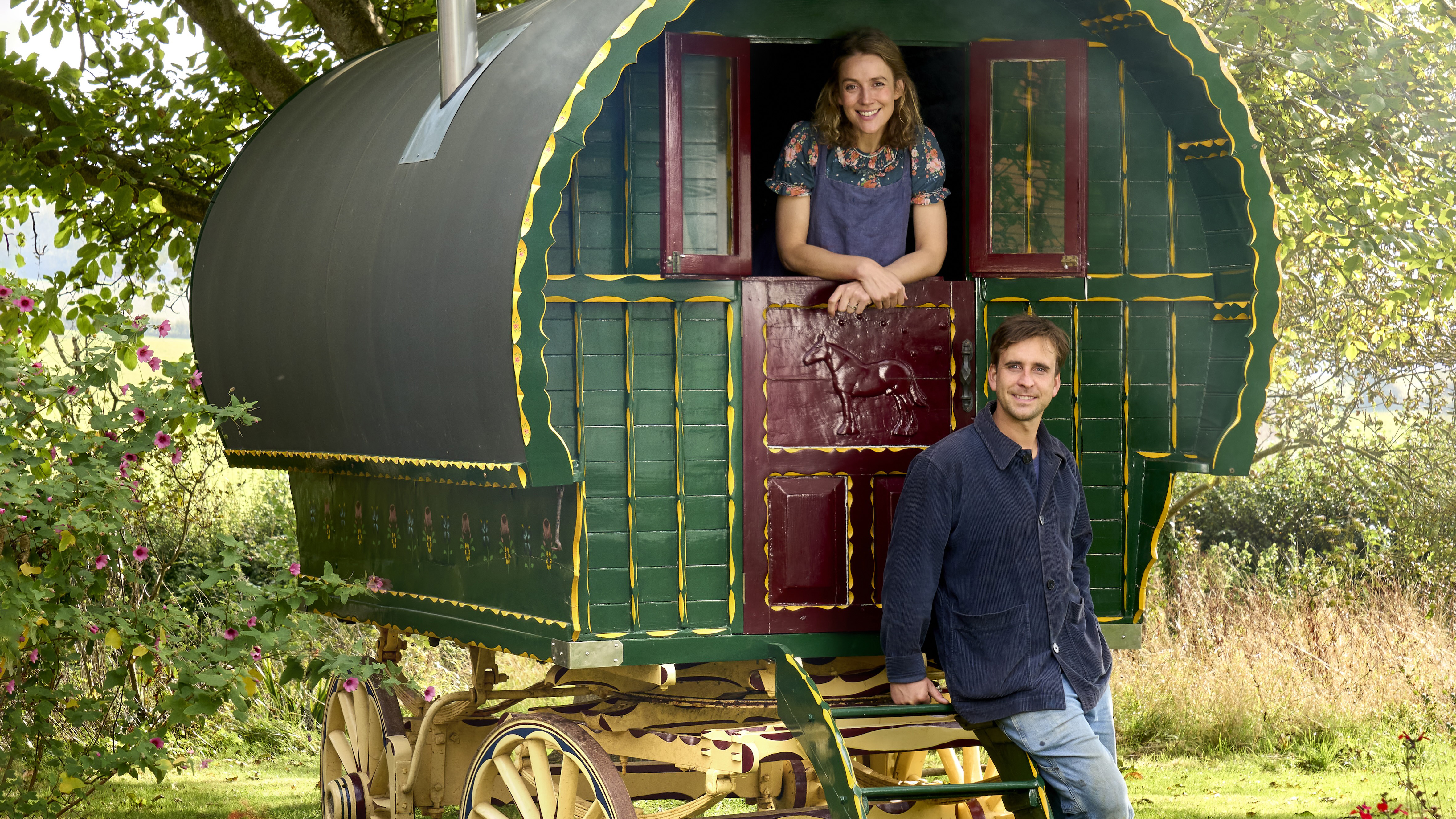 Tess and Alfred Newall with their decorative wagon