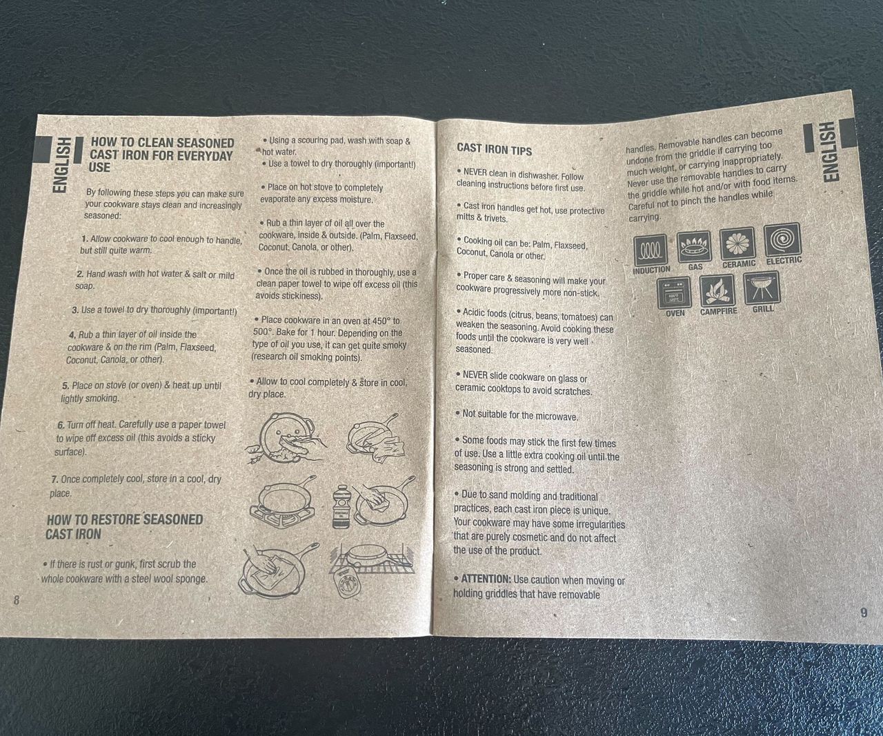 A light brown colored instruction manual on a black kitche counter