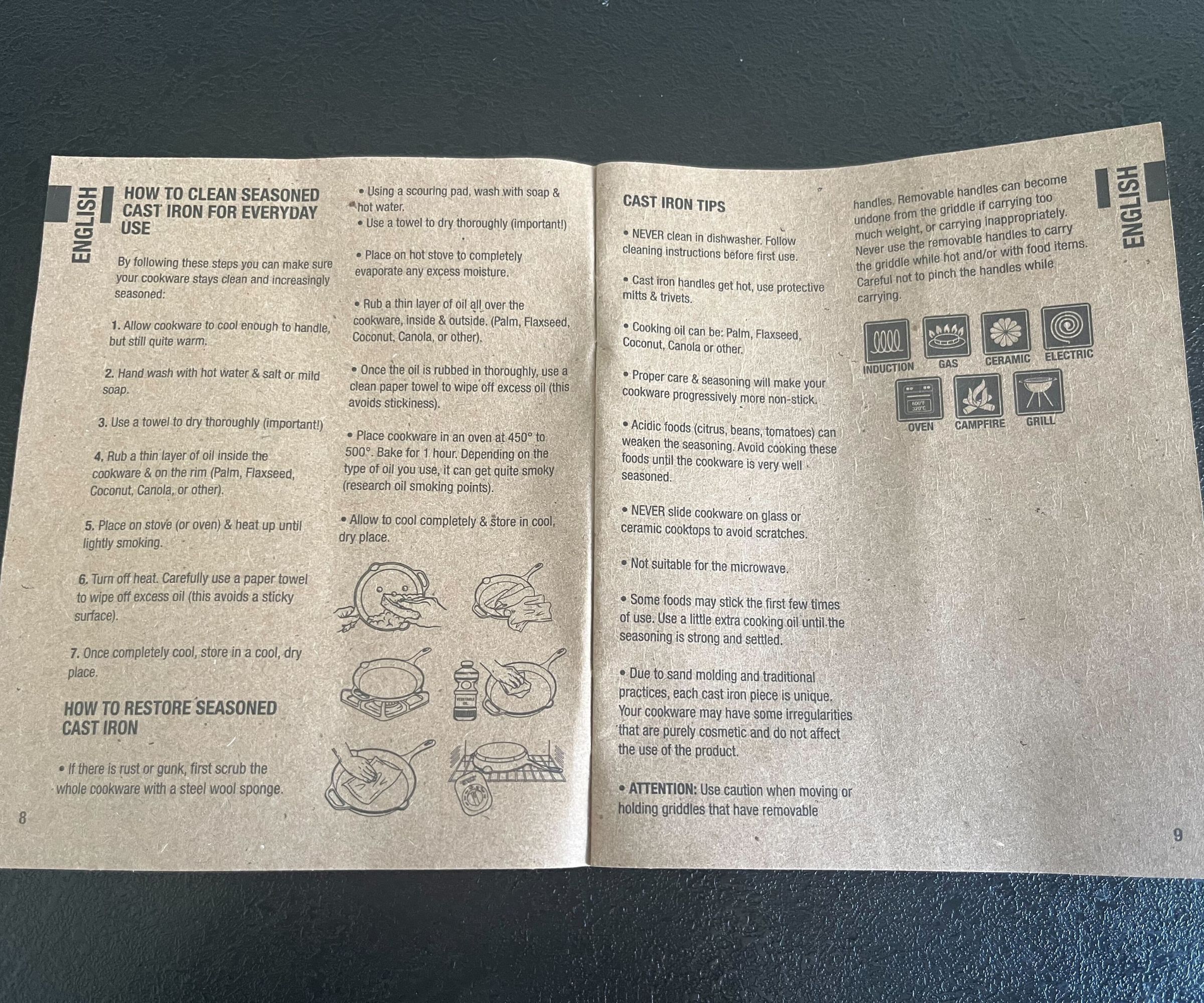 A light brown colored instruction manual on a black kitche counter