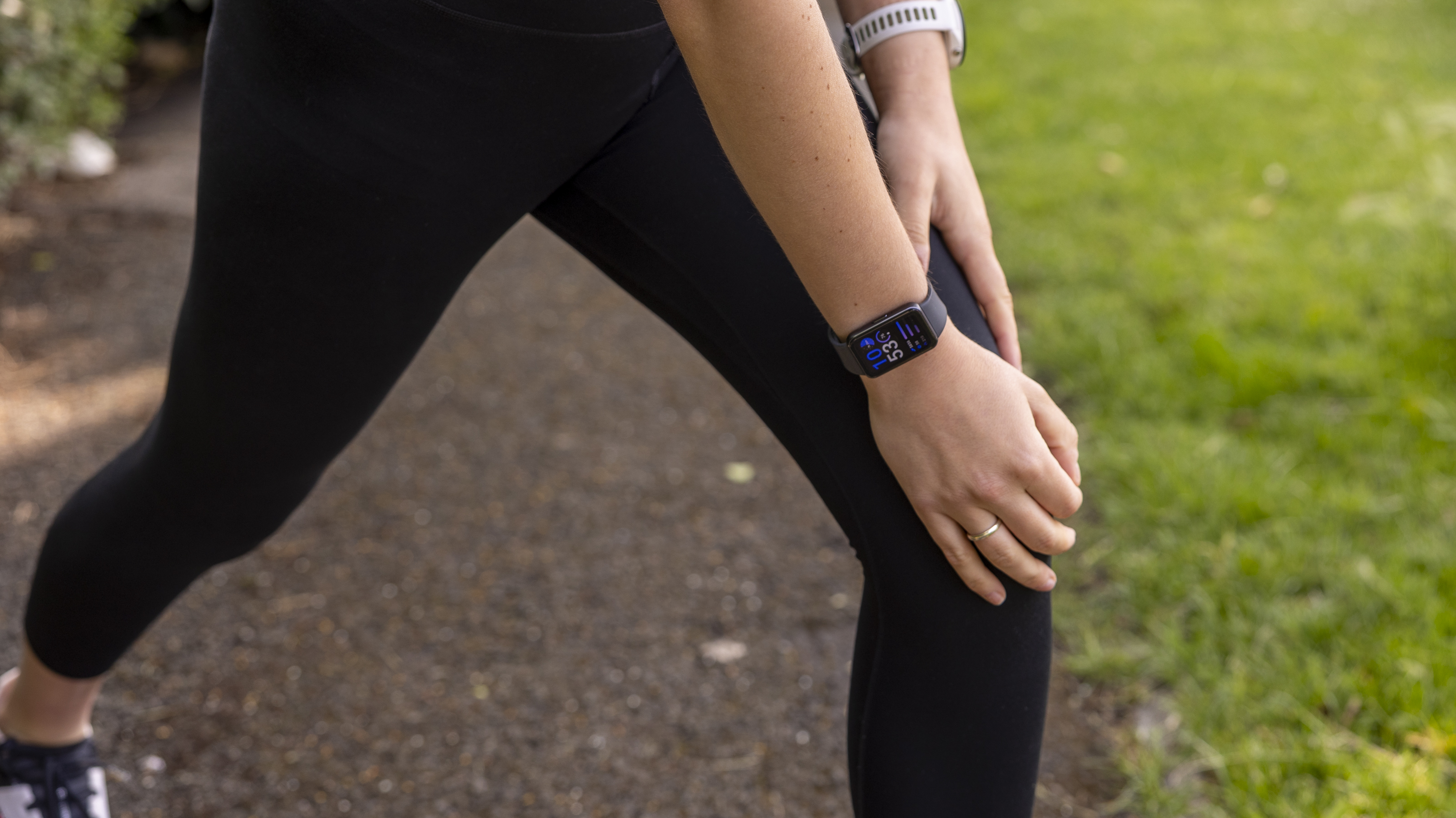The Samsung Galaxy Fit 3 watch in grey worn on a female wrist