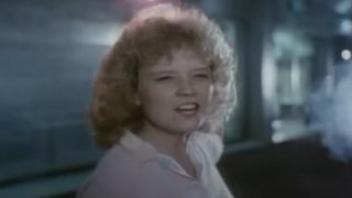 Kelli Maroney as Alison Parks telling a Killbot to have a nice day in Chopping Mall