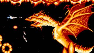 A screenshot from Arcade Archives GRADIUS III on Switch, showing a huge three-headed dragon.